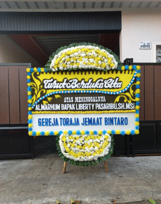 Papan Bunga Duka di Payung